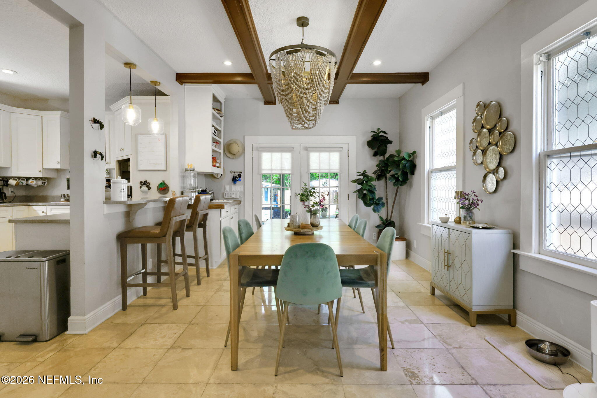 2837 Post Street Jacksonville, FL 32205 - Photo 18 of 70 a view of a dining area with furniture and a chandelier