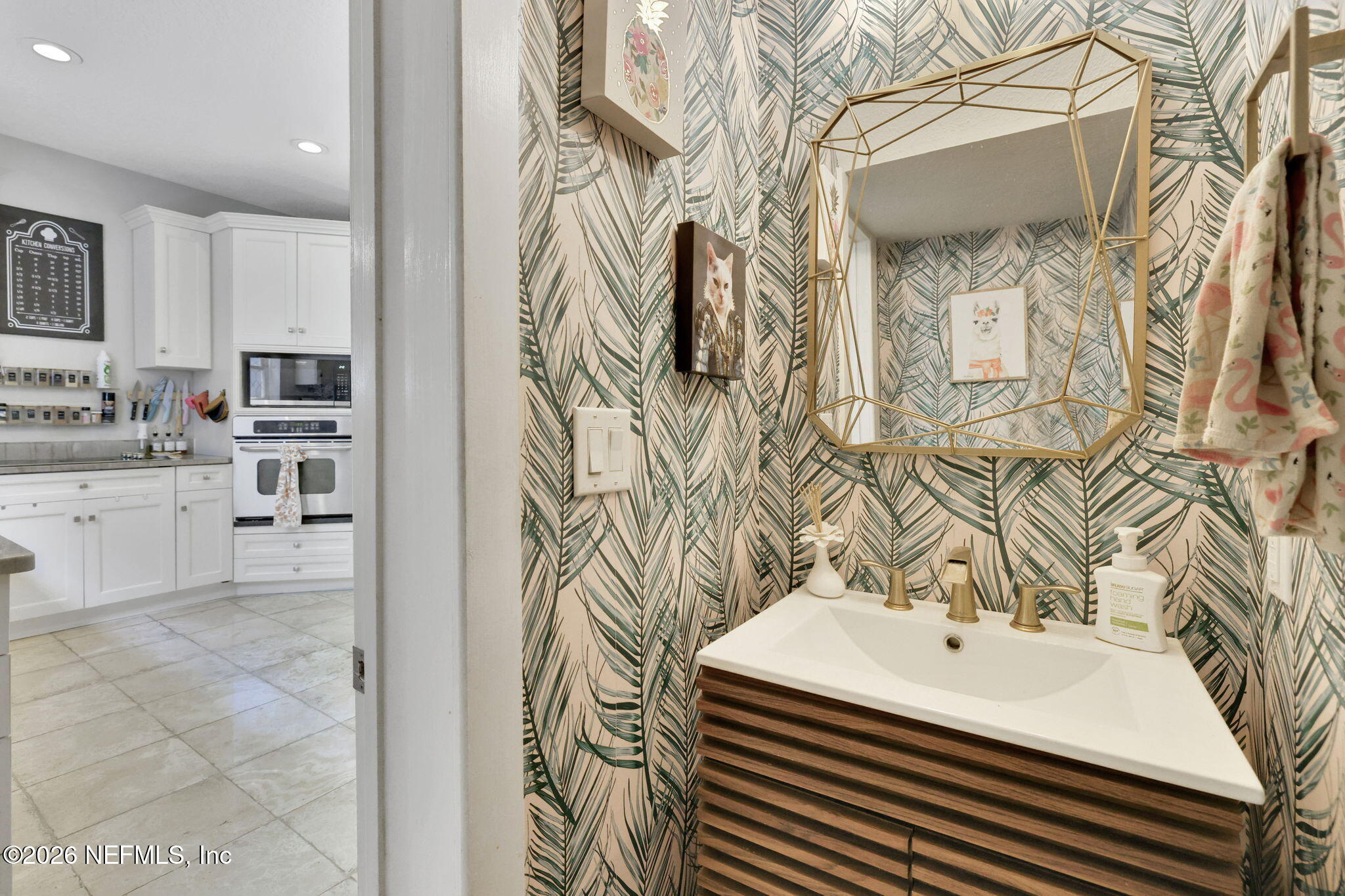 2837 Post Street Jacksonville, FL 32205 - Photo 24 of 70 a bathroom with a sink a mirror and a shower