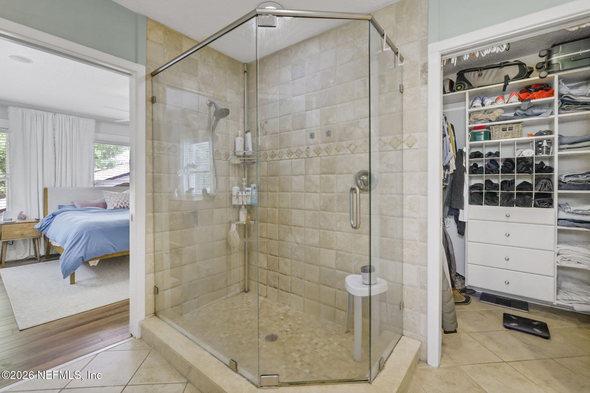 2837 Post Street Jacksonville, FL 32205 - Photo 43 of 70 a bathroom with a shower and a sink mirror