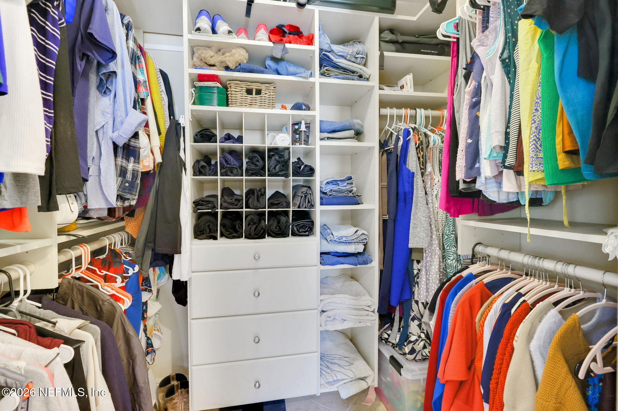 2837 Post Street Jacksonville, FL 32205 - Photo 47 of 70 a view of walk in closet with clothes and shoes