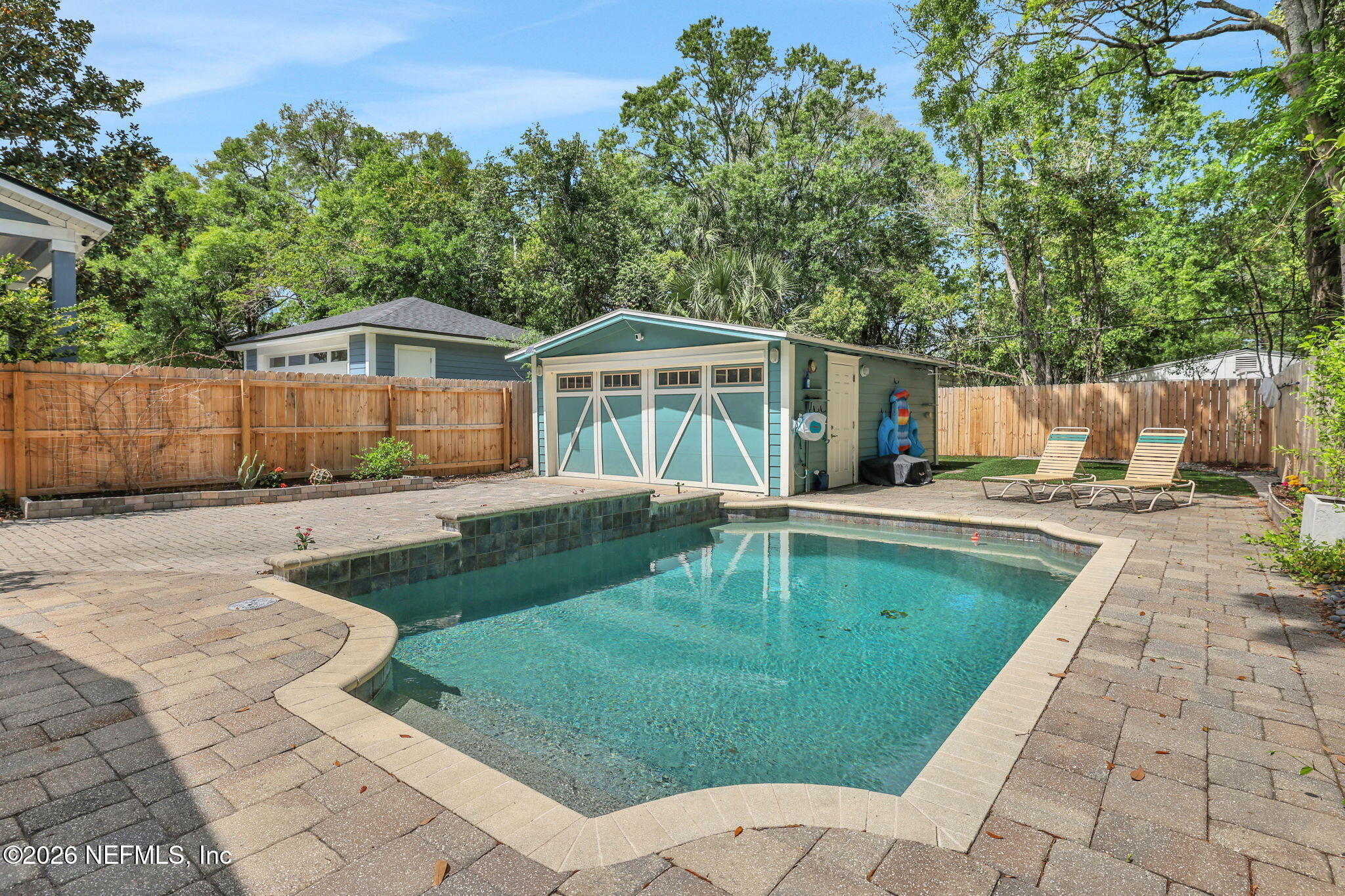 2837 Post Street Jacksonville, FL 32205 - Photo 55 of 70 a swimming pool with outdoor seating and yard
