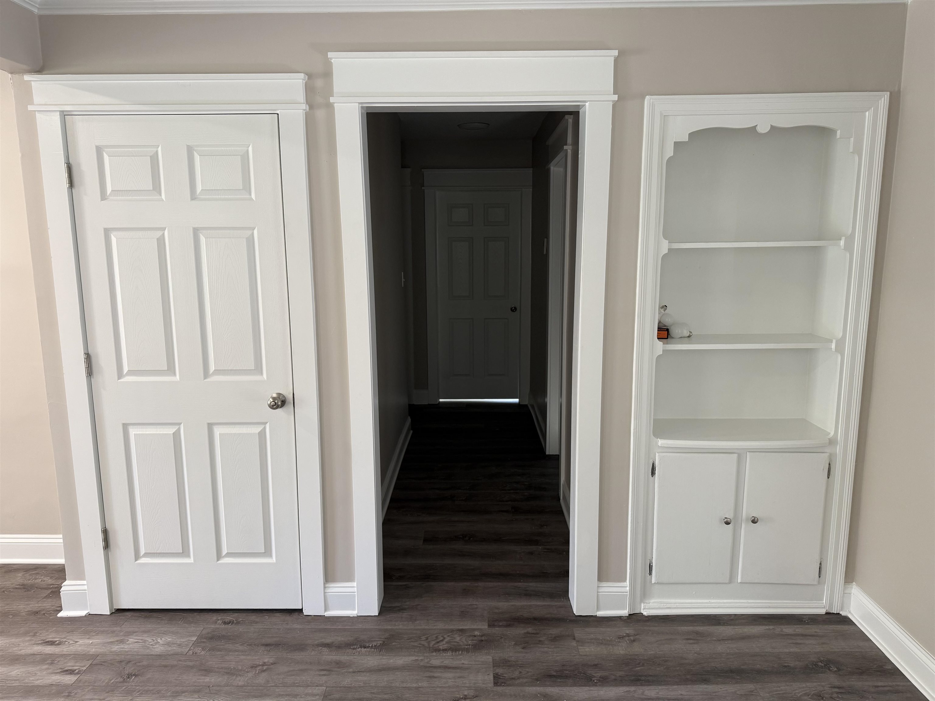 991 McEvers Road Memphis, TN 38111 - Photo 8 of 28 Hallway with baseboards and dark wood-style floors