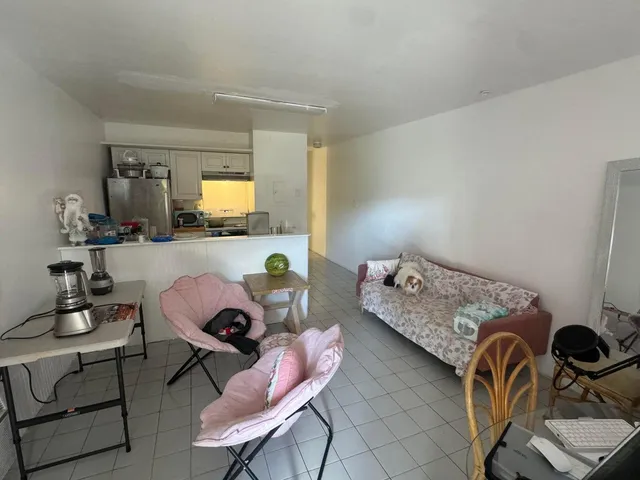 a bedroom with furniture and a bed