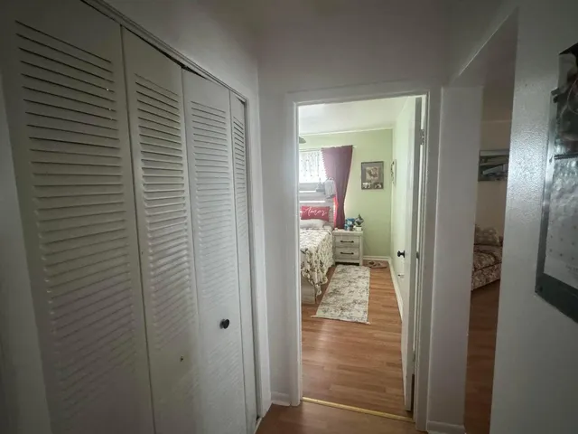 a view of a livingroom and a bathroom
