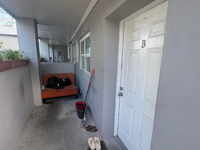a bed room with furniture and a window