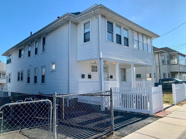 a front view of a house with a porch