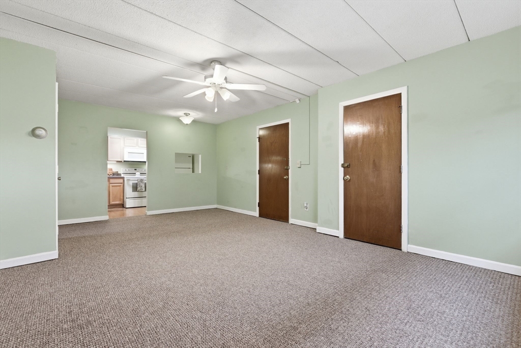 50 Water Street, Unit 46 Medford, MA 02155 - Photo 15 of 37 an empty room with closet and windows