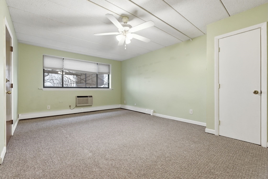 50 Water Street, Unit 46 Medford, MA 02155 - Photo 2 of 37 an empty room with a empty space and window