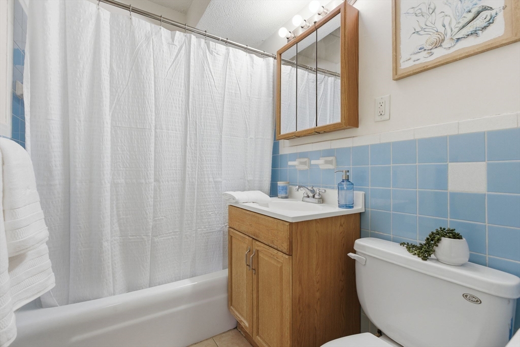 50 Water Street, Unit 46 Medford, MA 02155 - Photo 21 of 37 a bathroom with a sink toilet and shower