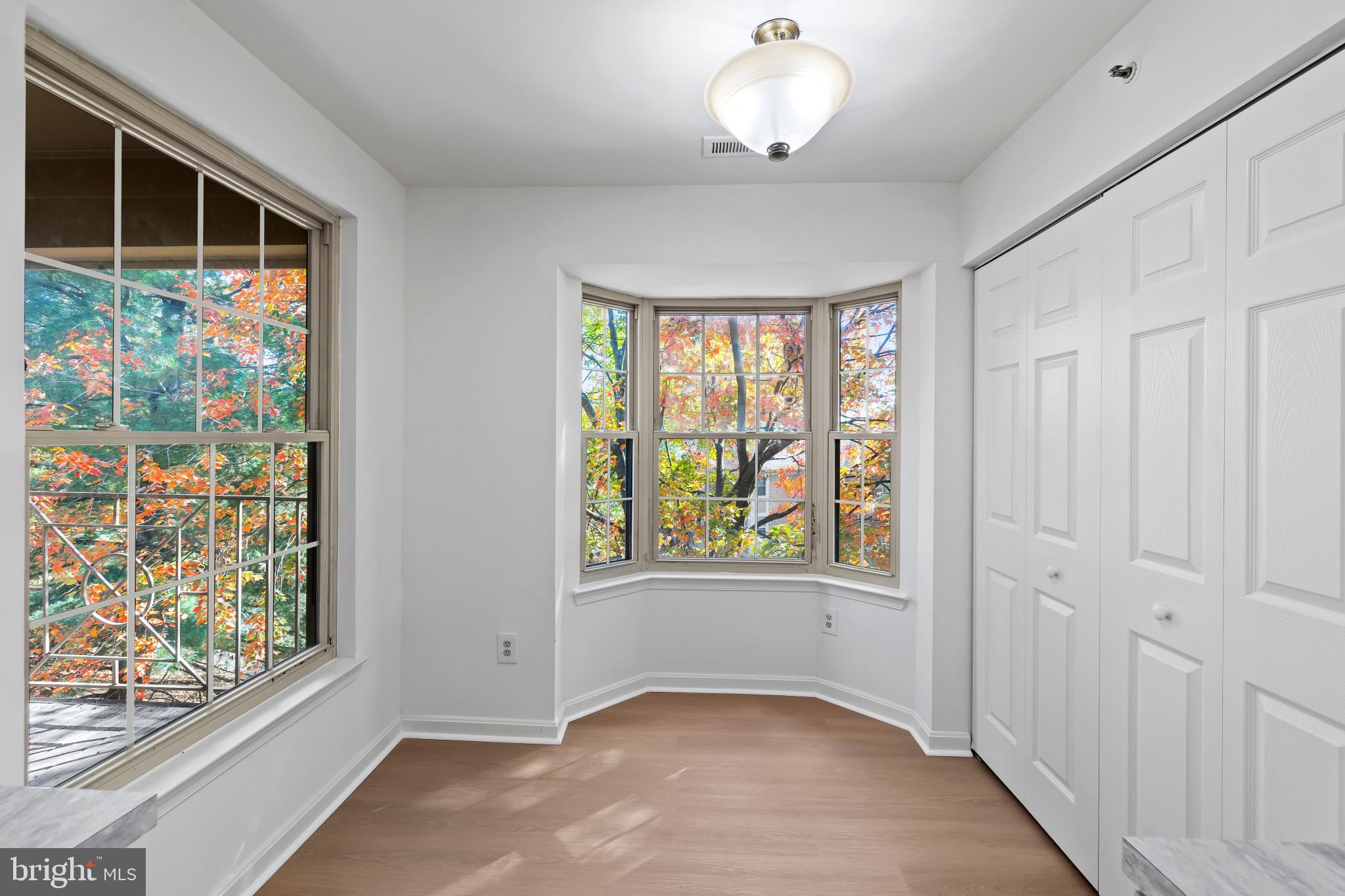 203 Star Pointe Court, Unit 3C Abingdon, MD 21009 - Photo 15 of 26 an empty room with windows