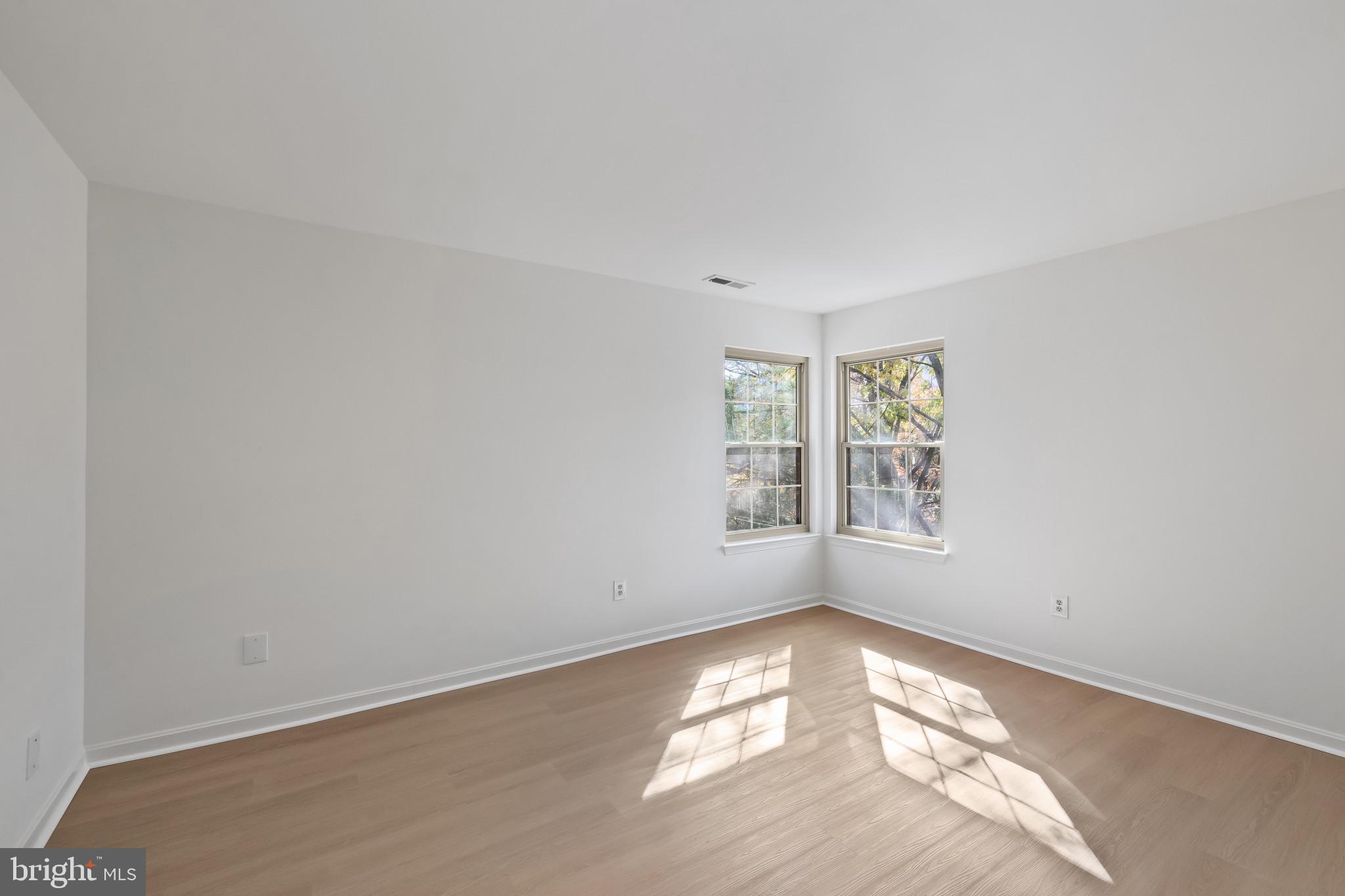 203 Star Pointe Court, Unit 3C Abingdon, MD 21009 - Photo 17 of 26 an empty room with windows