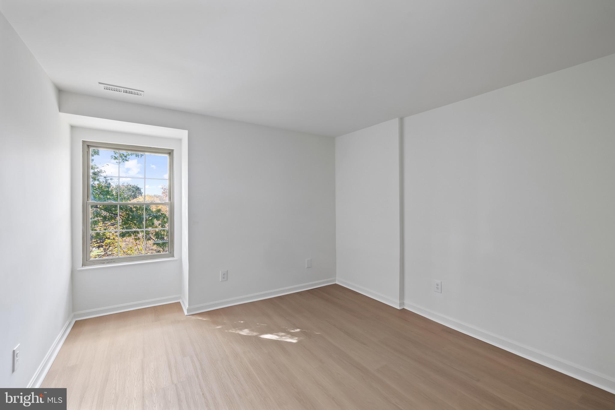 203 Star Pointe Court, Unit 3C Abingdon, MD 21009 - Photo 21 of 26 an empty room with a window