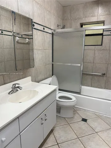 a bathroom with a sink and a shower
