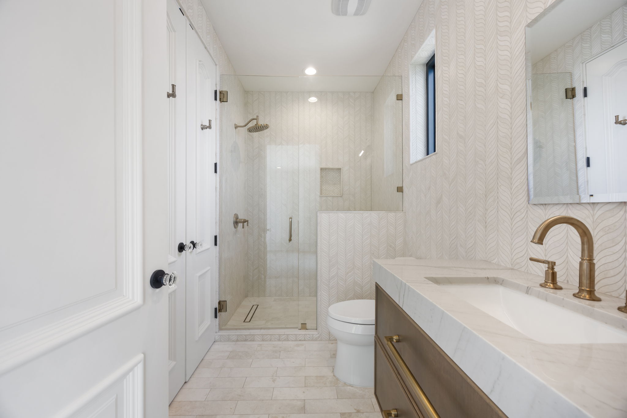 1496 Buffalo Gap Road Lakeway, TX 78734 - Photo 14 of 37 A well-appointed bathroom with a spacious walk-in shower and elegant vanity.