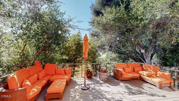 a view of outdoor space yard deck patio and fire pit