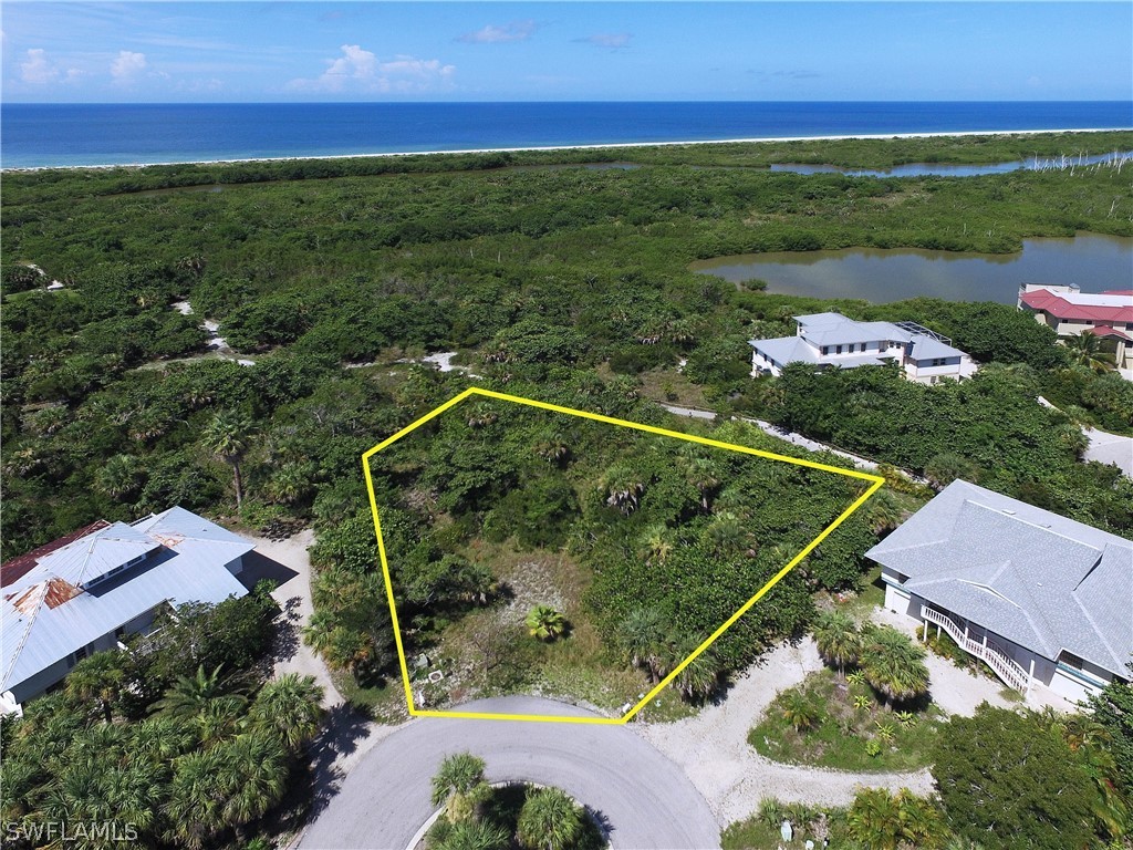 1825 Long Point Lane Sanibel, FL 33957 - Photo 2 of 3 a view of a tennis court