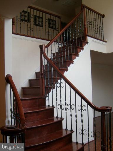 12019 Fort Washington Road Fort Washington, MD 20744 - Photo 13 of 14 Hardwood Staircase w/wrought-Iron Ballastrades