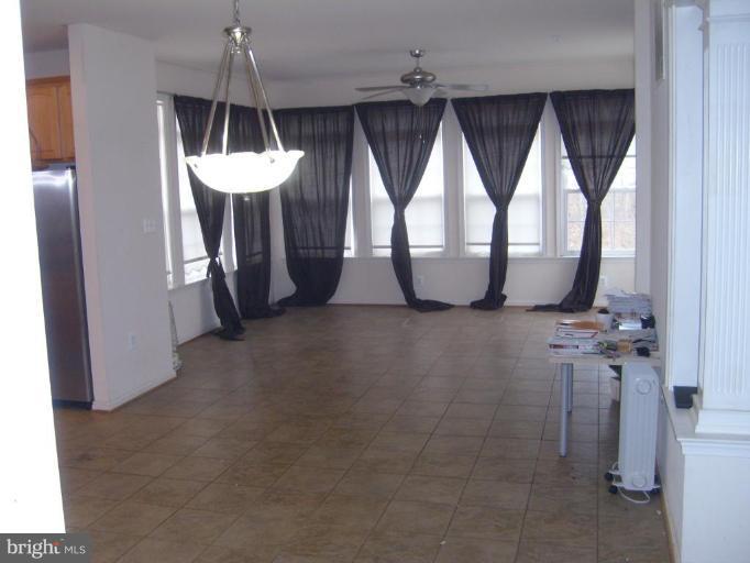12019 Fort Washington Road Fort Washington, MD 20744 - Photo 4 of 14 Bumped out Sunroom... loads of light and ceramic!