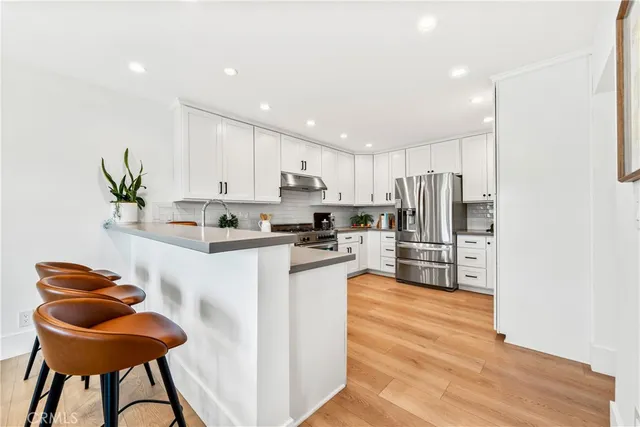 a bed room with a bed and a window