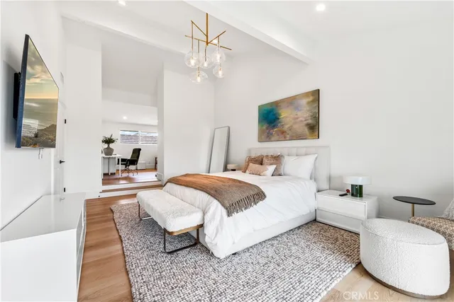a living room with furniture fireplace and window