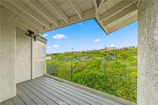 a view of swimming pool with seating area