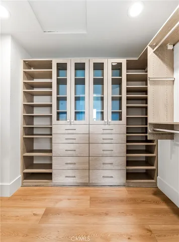 an aerial view of residential houses with outdoor space and swimming pool