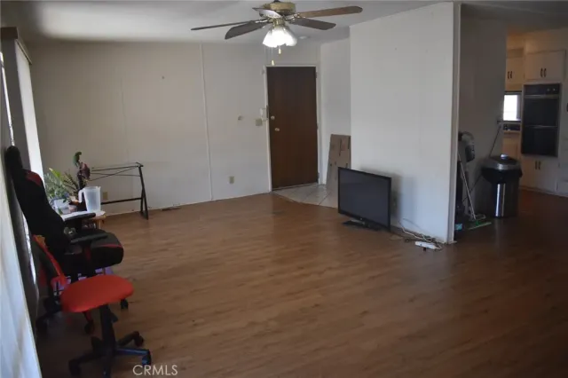 a view of a room with workspace and mirror