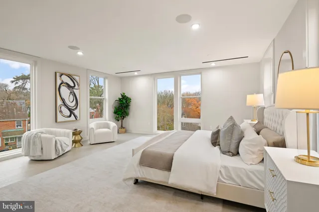 a bathroom with a double vanity sink mirror double and bathtub