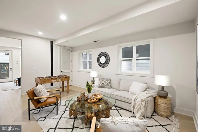 a bedroom with a bed and a potted plant