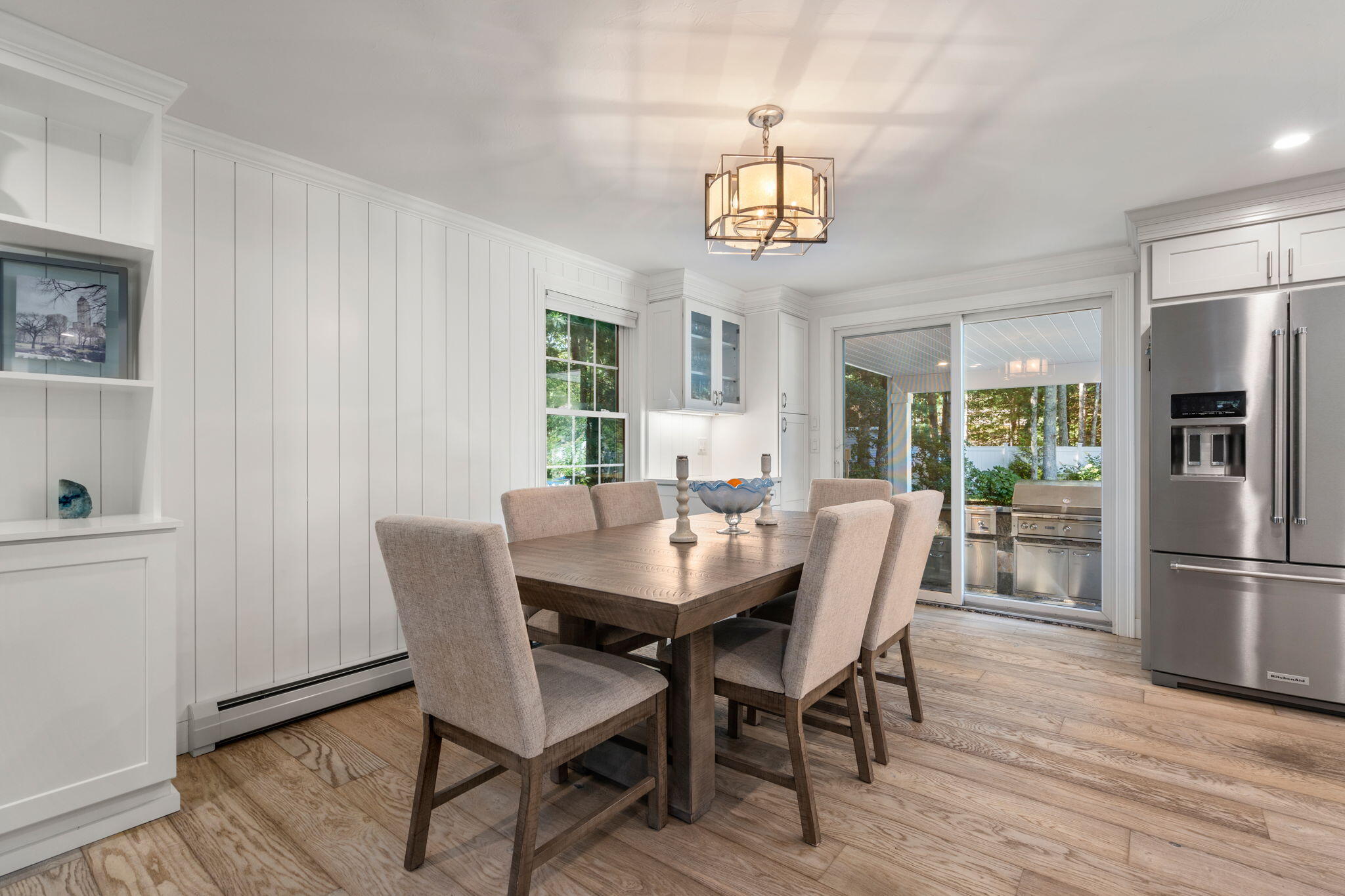 41 Old Fields Road Sandwich, MA 02563 - Photo 12 of 47 a view of a dining room with furniture window and wooden floor