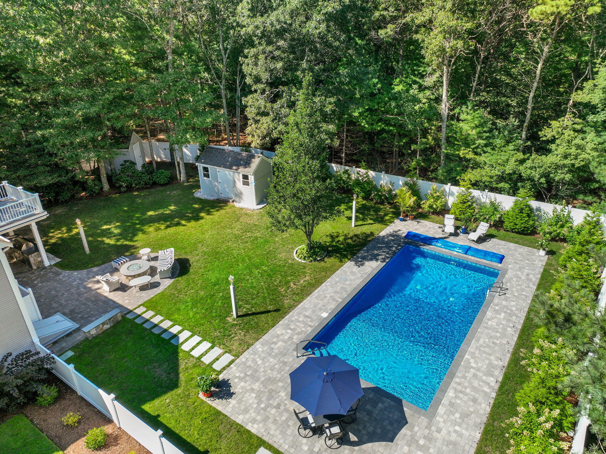 41 Old Fields Road Sandwich, MA 02563 - Photo 31 of 47 a view of a backyard with sitting area