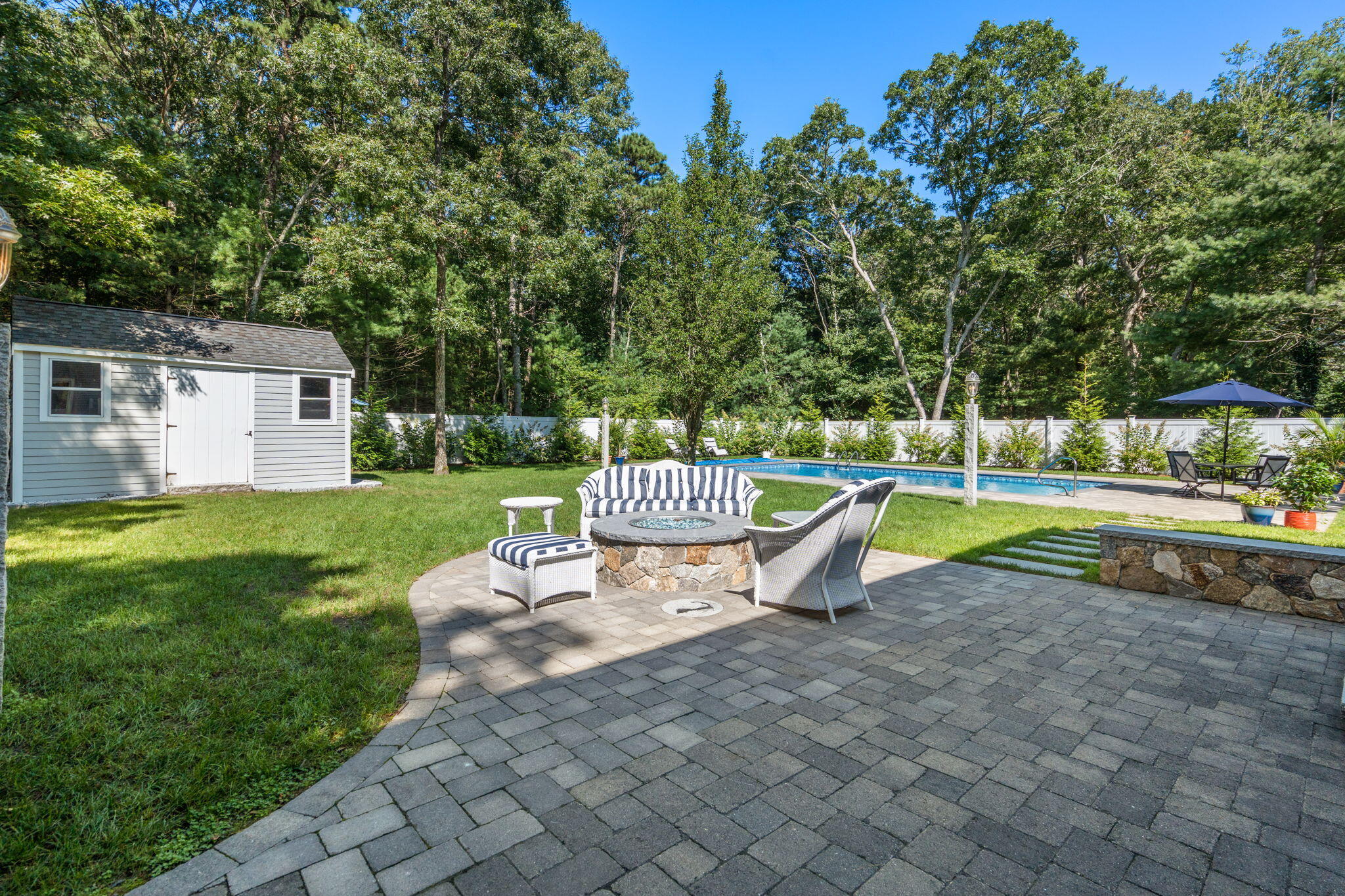 41 Old Fields Road Sandwich, MA 02563 - Photo 33 of 47 a park view with a bench and trees