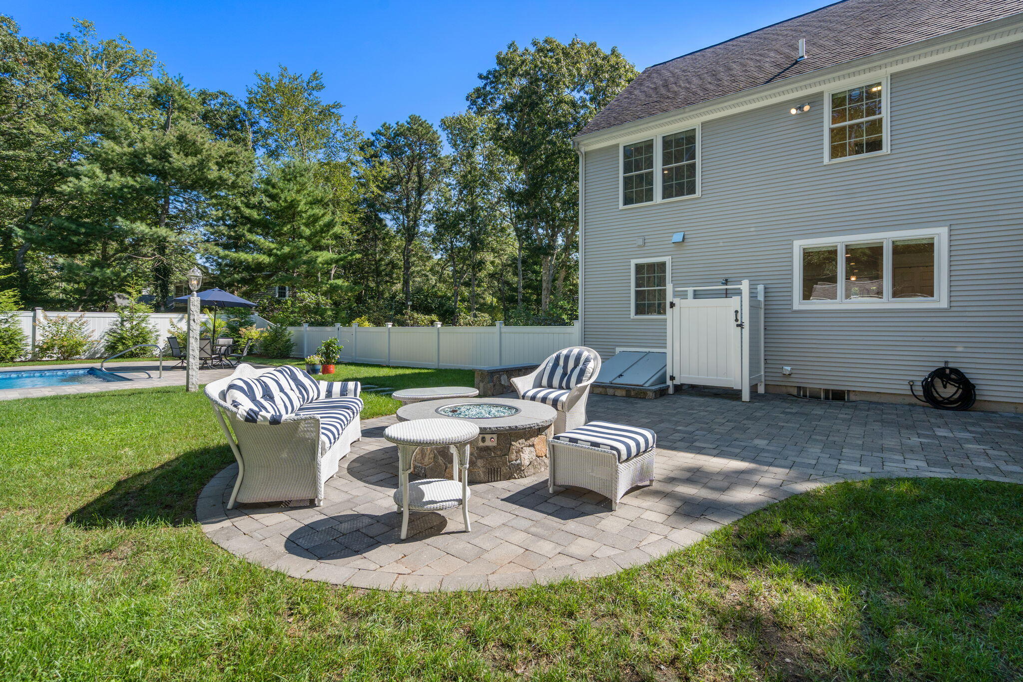 41 Old Fields Road Sandwich, MA 02563 - Photo 35 of 47 a house view with a sitting space and garden