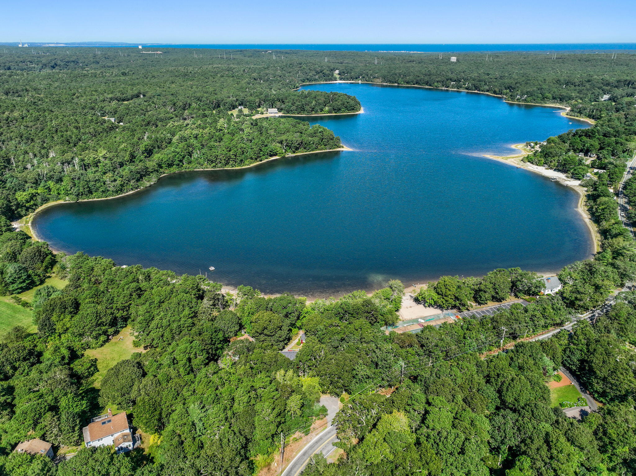 41 Old Fields Road Sandwich, MA 02563 - Photo 40 of 47 an aerial view of ocean with residential houses with outdoor space and trees