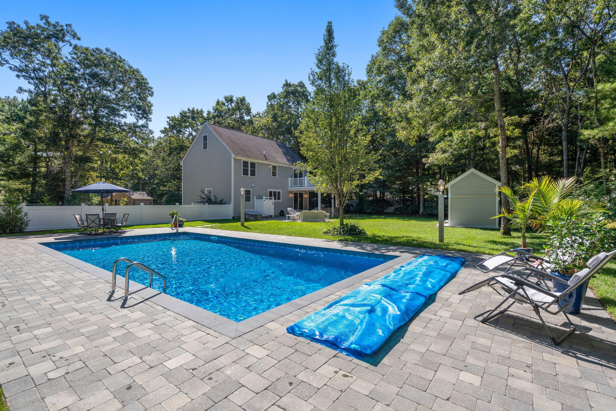 41 Old Fields Road Sandwich, MA 02563 - Photo 4 of 47 a swimming pool with outdoor seating and yard