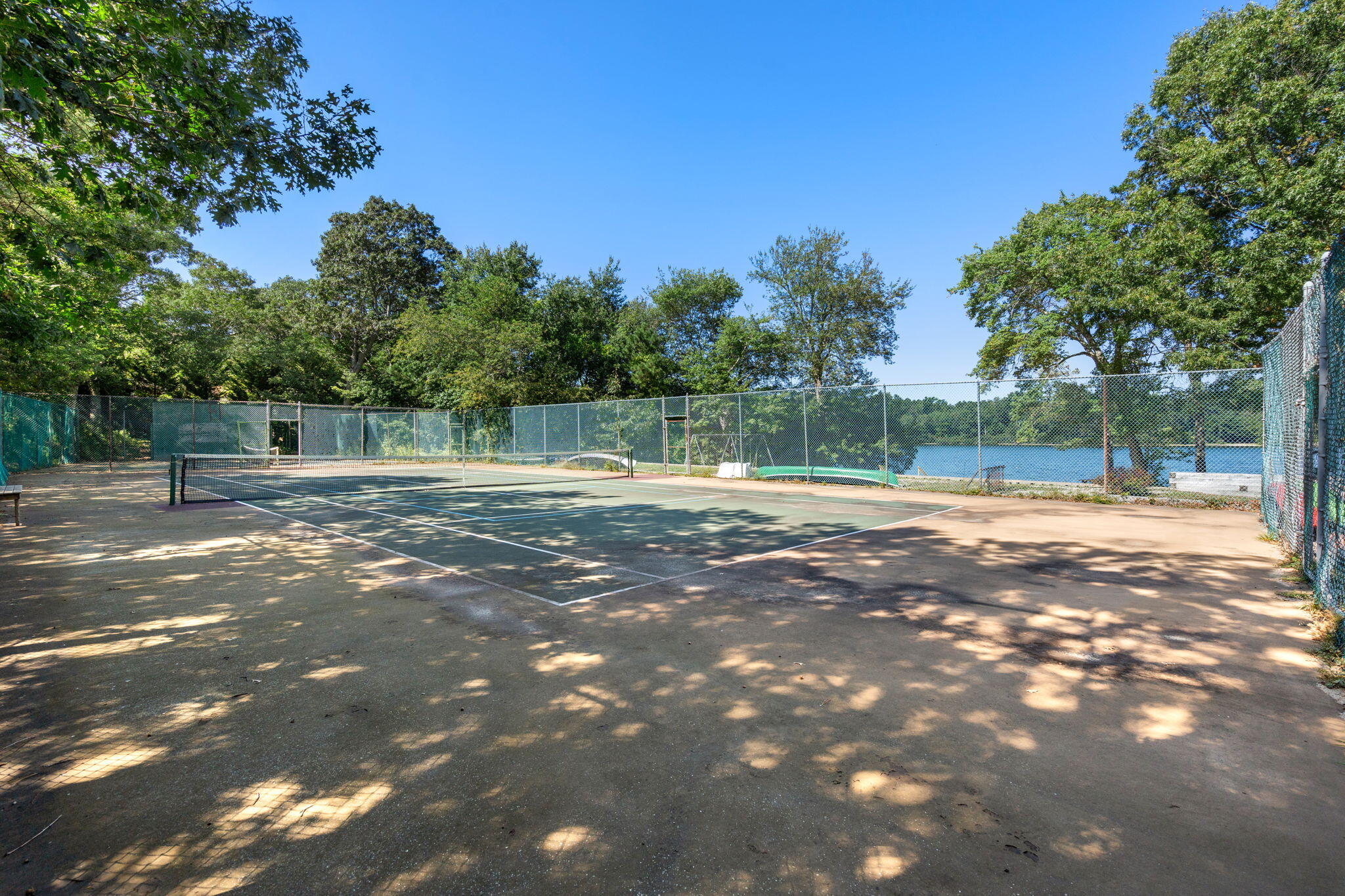 41 Old Fields Road Sandwich, MA 02563 - Photo 44 of 47 a backyard of a house with lots of green space