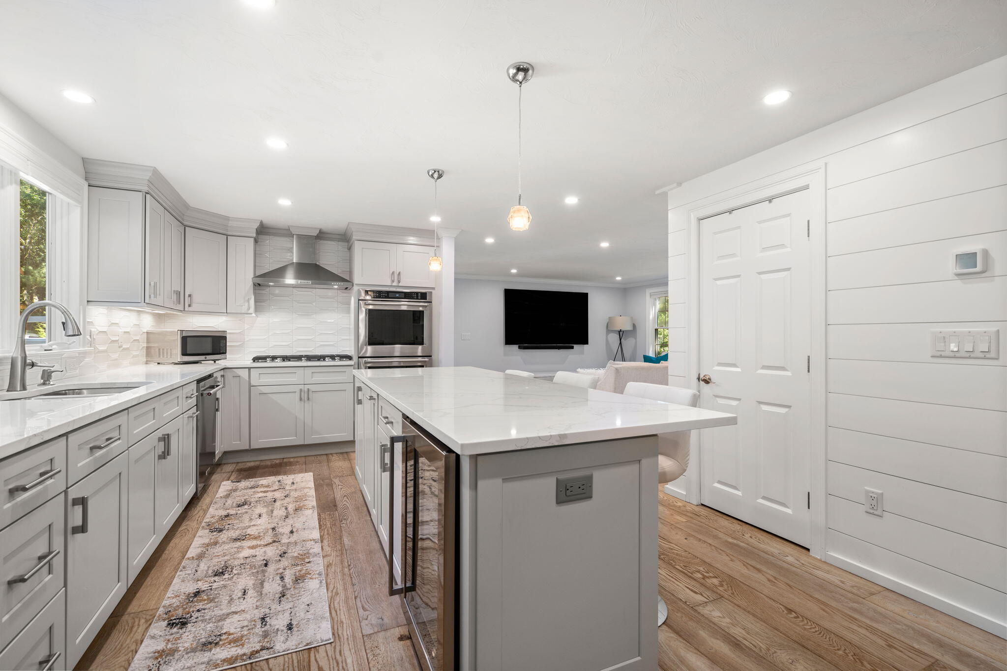 41 Old Fields Road Sandwich, MA 02563 - Photo 9 of 47 a kitchen with a sink and cabinets