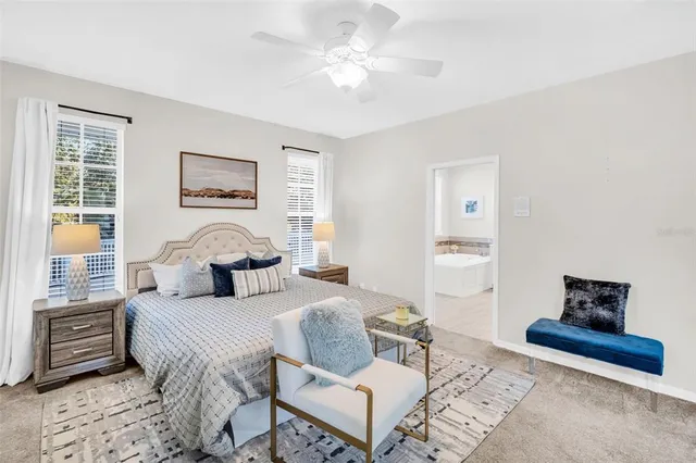 a bathroom with a sink a mirror and a vanity