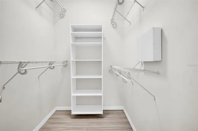 a view of a porch with a floor to ceiling window