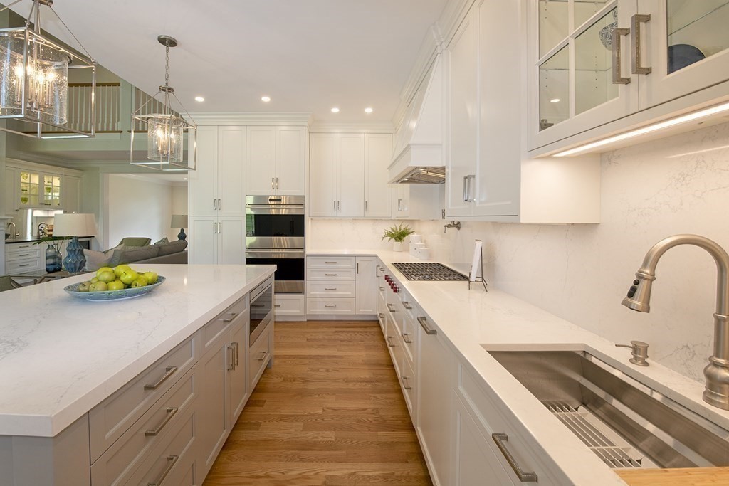 10 Trevino Circle Andover, MA 01810 - Photo 12 of 33 a large kitchen with stainless steel appliances granite countertop a lot of counter space and a sink