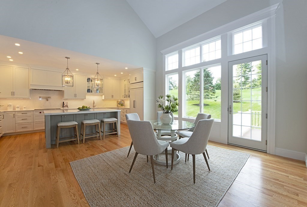 10 Trevino Circle Andover, MA 01810 - Photo 16 of 33 a dining room with furniture and wooden floor