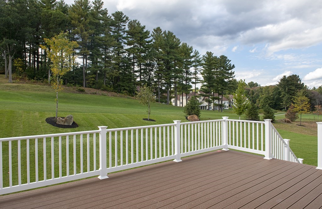 10 Trevino Circle Andover, MA 01810 - Photo 33 of 33 a view of a deck and yard with green space