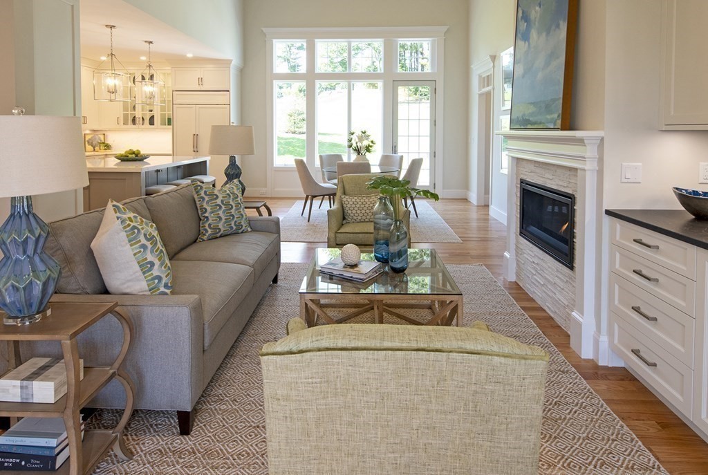 10 Trevino Circle Andover, MA 01810 - Photo 6 of 33 a living room with furniture large window and a fireplace