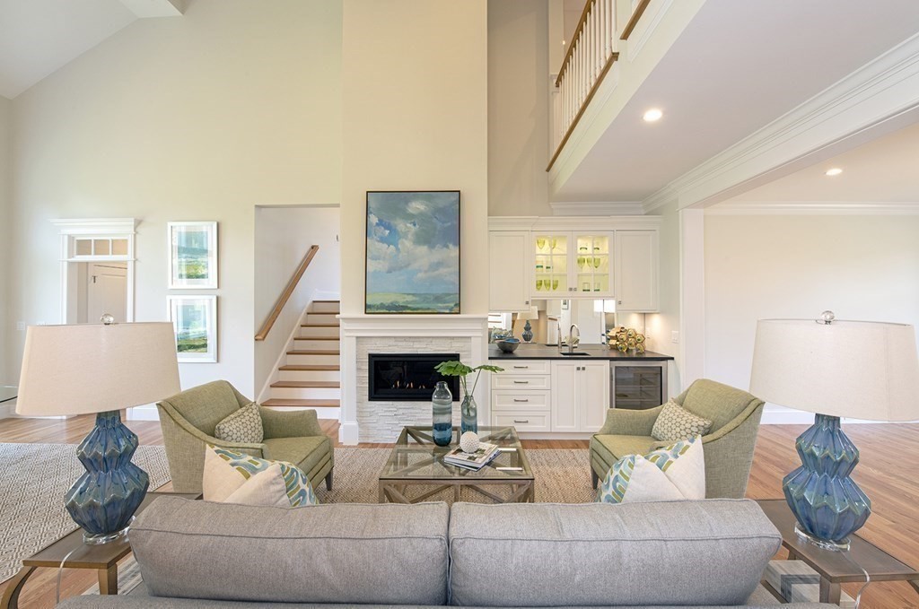 10 Trevino Circle Andover, MA 01810 - Photo 7 of 33 a living room with furniture and a fireplace