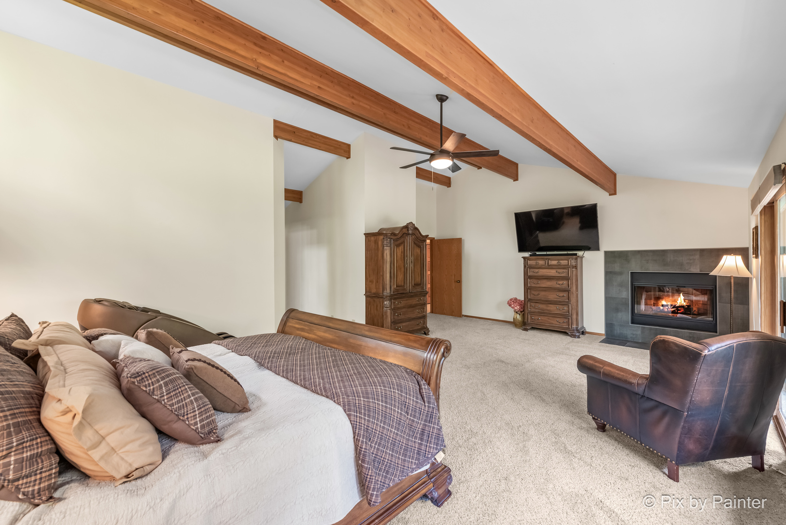 3804 Ridge Road Spring Grove, IL 60081 - Photo 22 of 55 a bedroom with a bed couch and fireplace