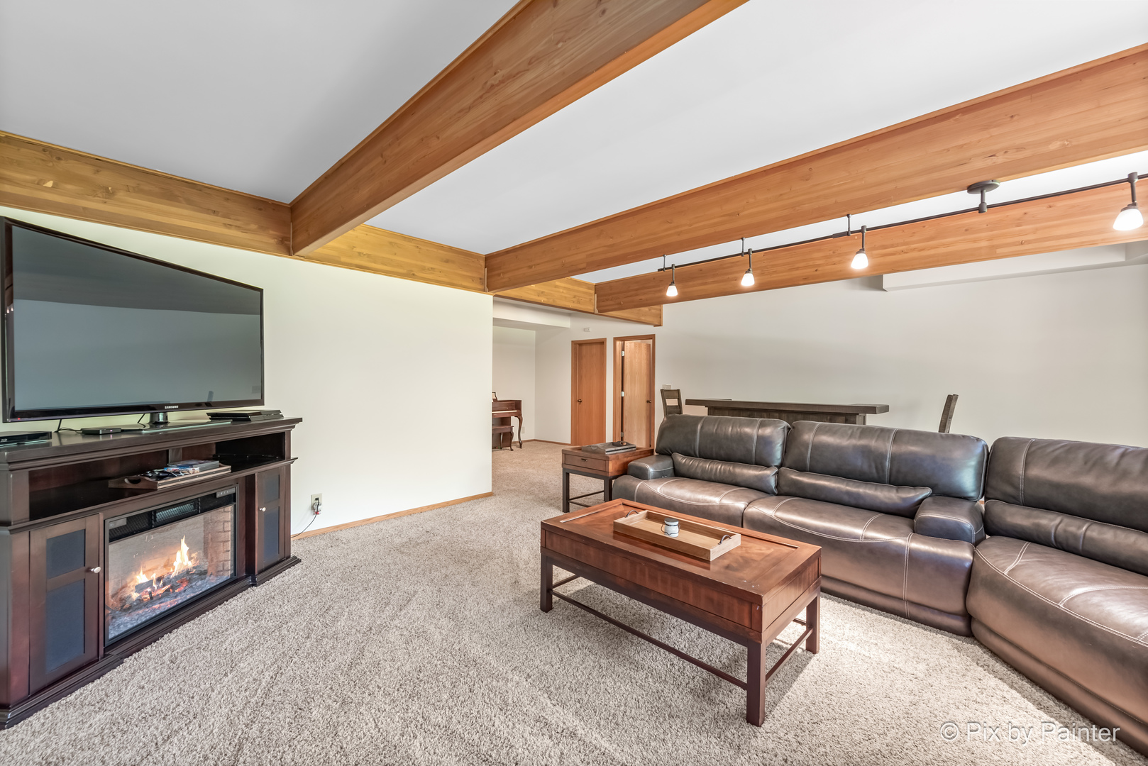 3804 Ridge Road Spring Grove, IL 60081 - Photo 33 of 55 a living room with furniture and a flat screen tv