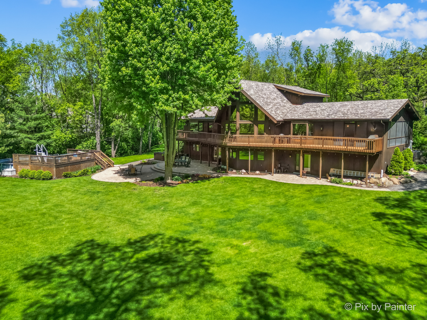 3804 Ridge Road Spring Grove, IL 60081 - Photo 49 of 55 a aerial view of a house with a yard table and chairs