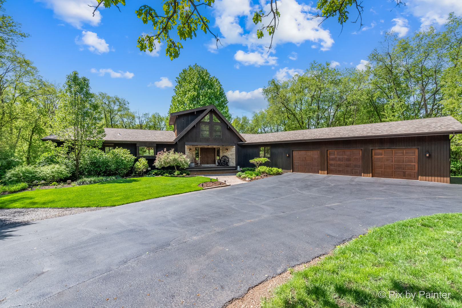 3804 Ridge Road Spring Grove, IL 60081 - Photo 10 of 55 a front view of a house with a yard and garage
