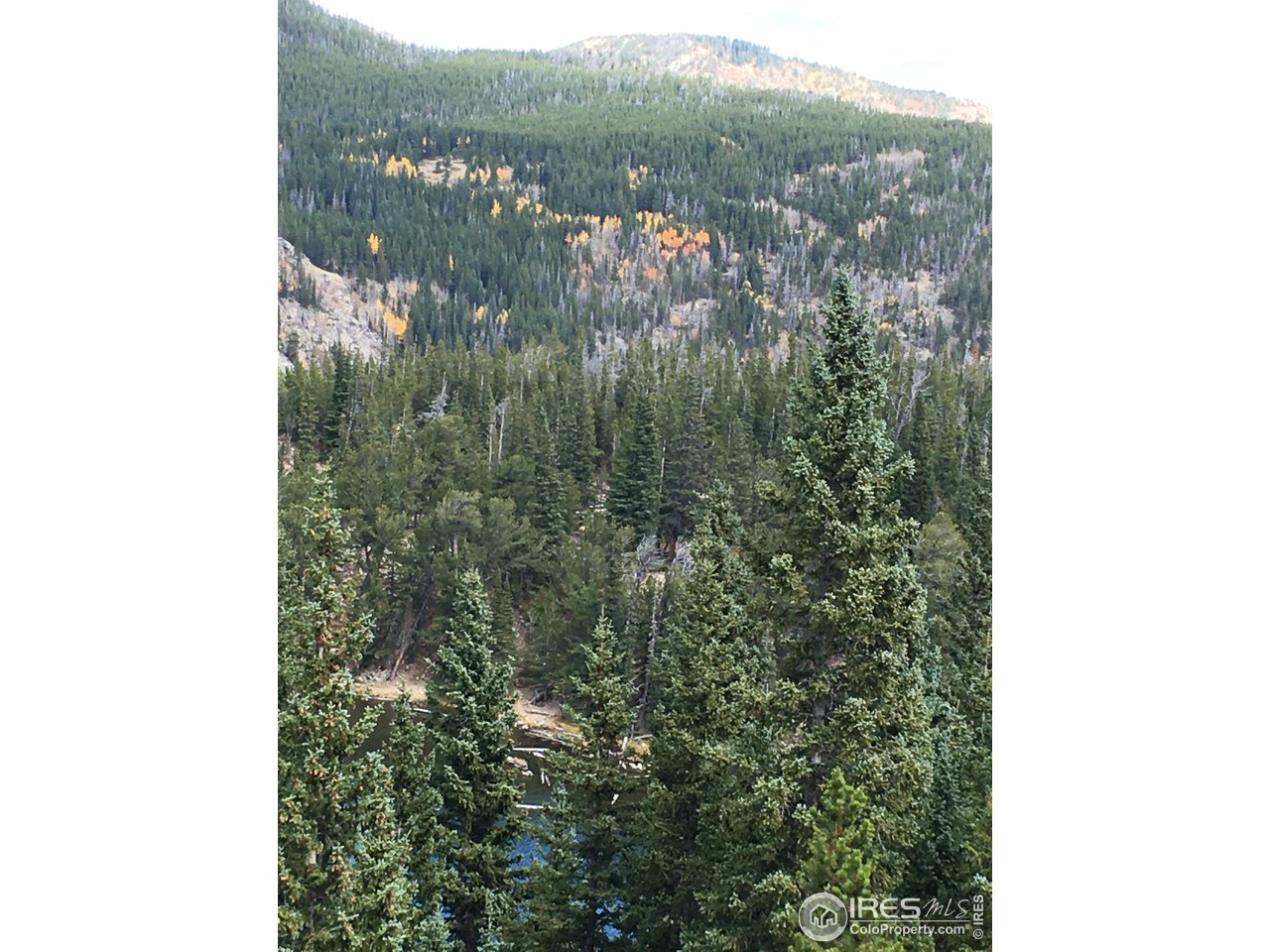 Undisclosed Address Nederland, CO 80466 - Photo 9 of 10 a view of a city from a balcony