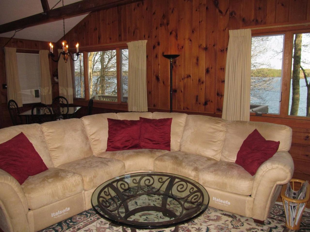 248 Pimlico Pond Road Mashpee, MA 02649 - Photo 12 of 22 a living room with furniture and a large window